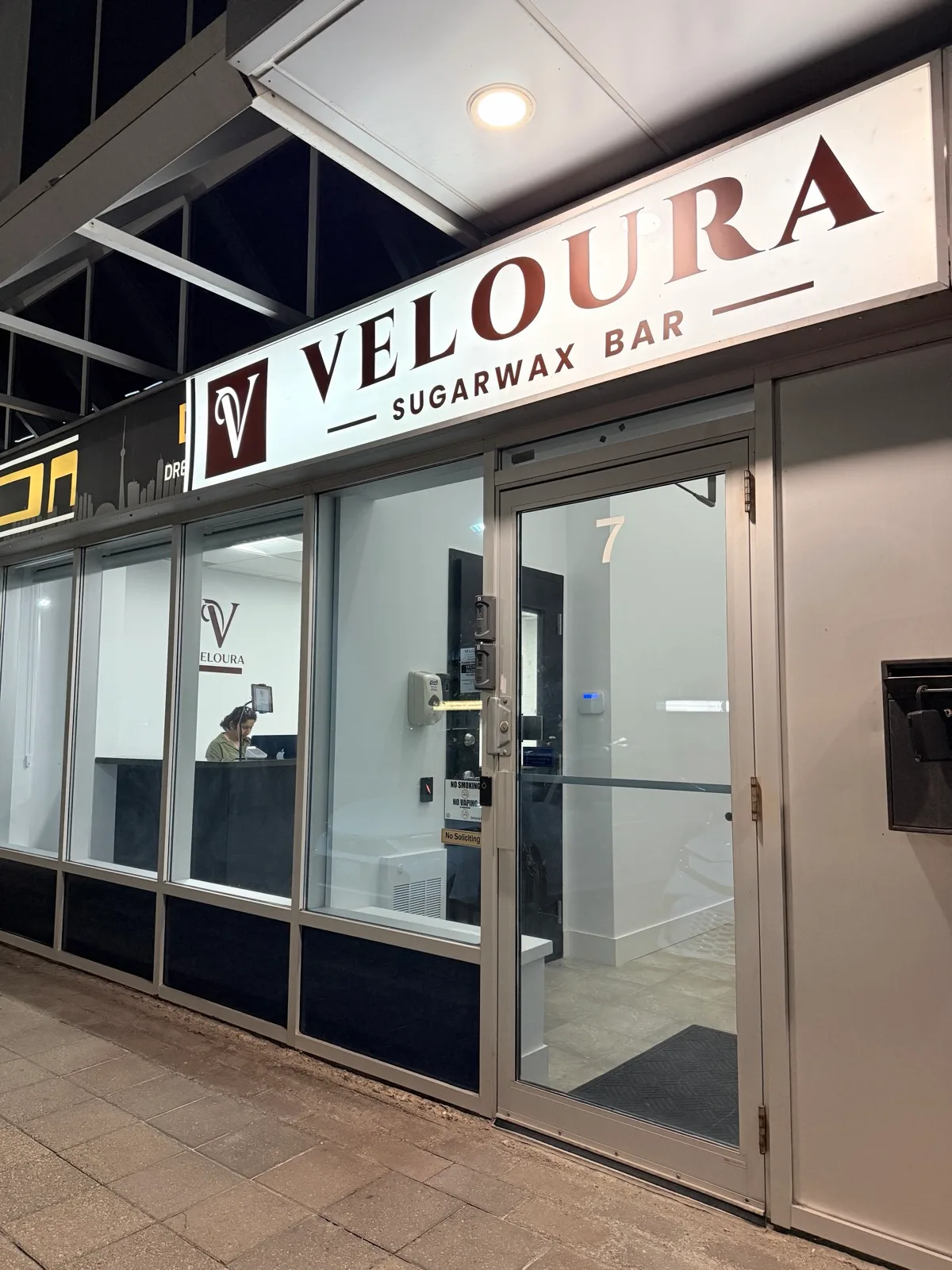 Veloura SugarWax Bar storefront at 7611 Pine Valley Dr, Unit 7, Woodbridge, Ontario — sugaring, waxing, threading and brow tinting studio