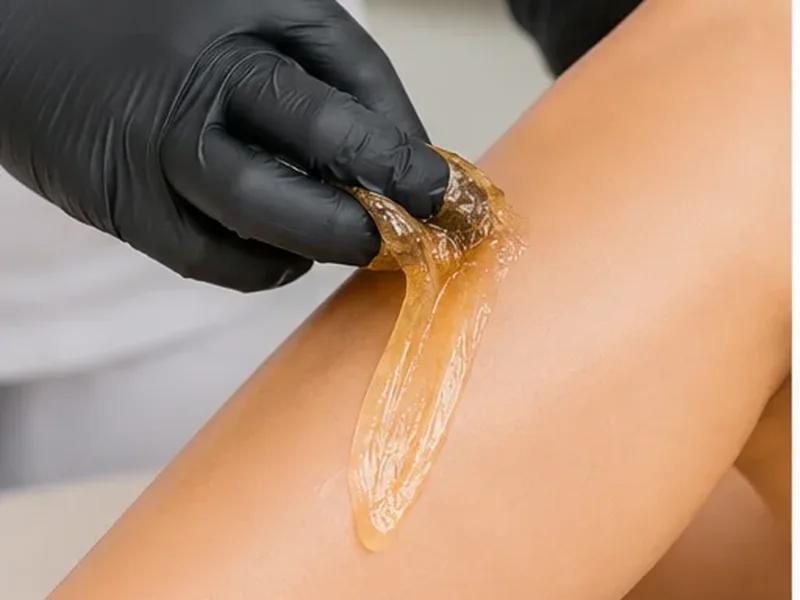 All-natural sugar paste applied by hand for a Brazilian sugaring at Veloura in Vaughan