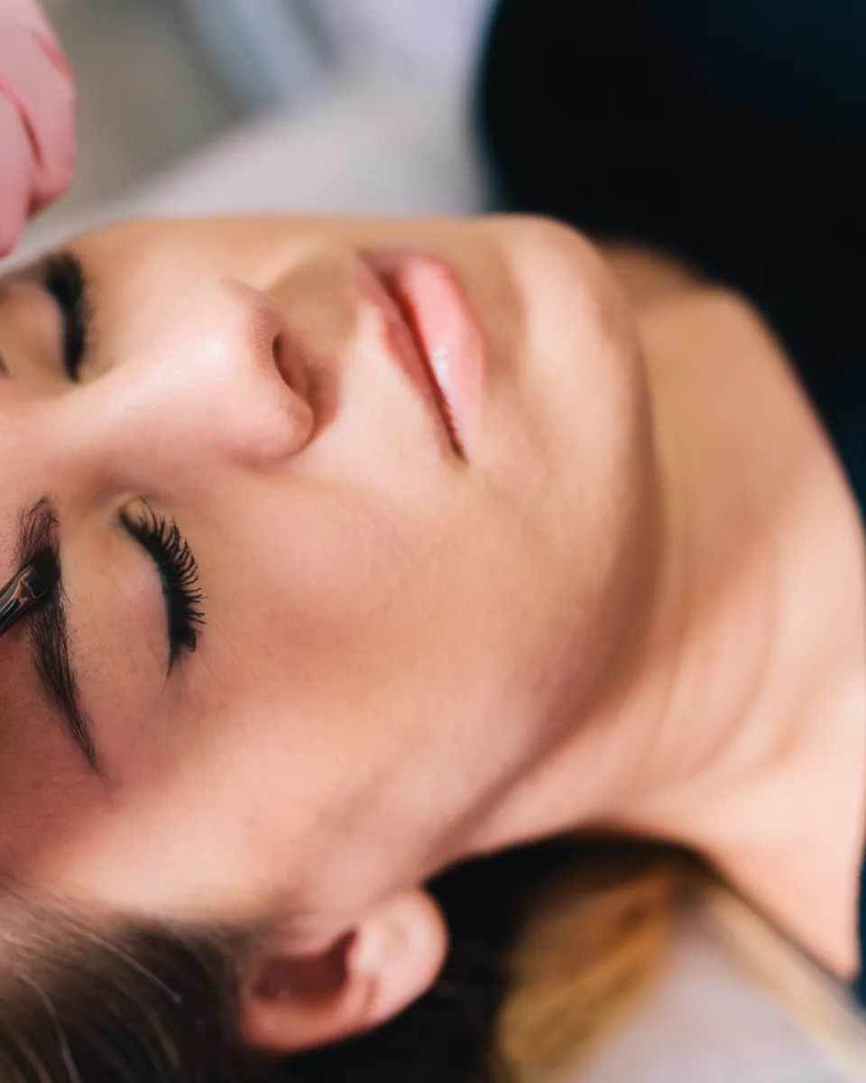 Professional brow shaping and tinting service at Veloura Sugarwax Bar